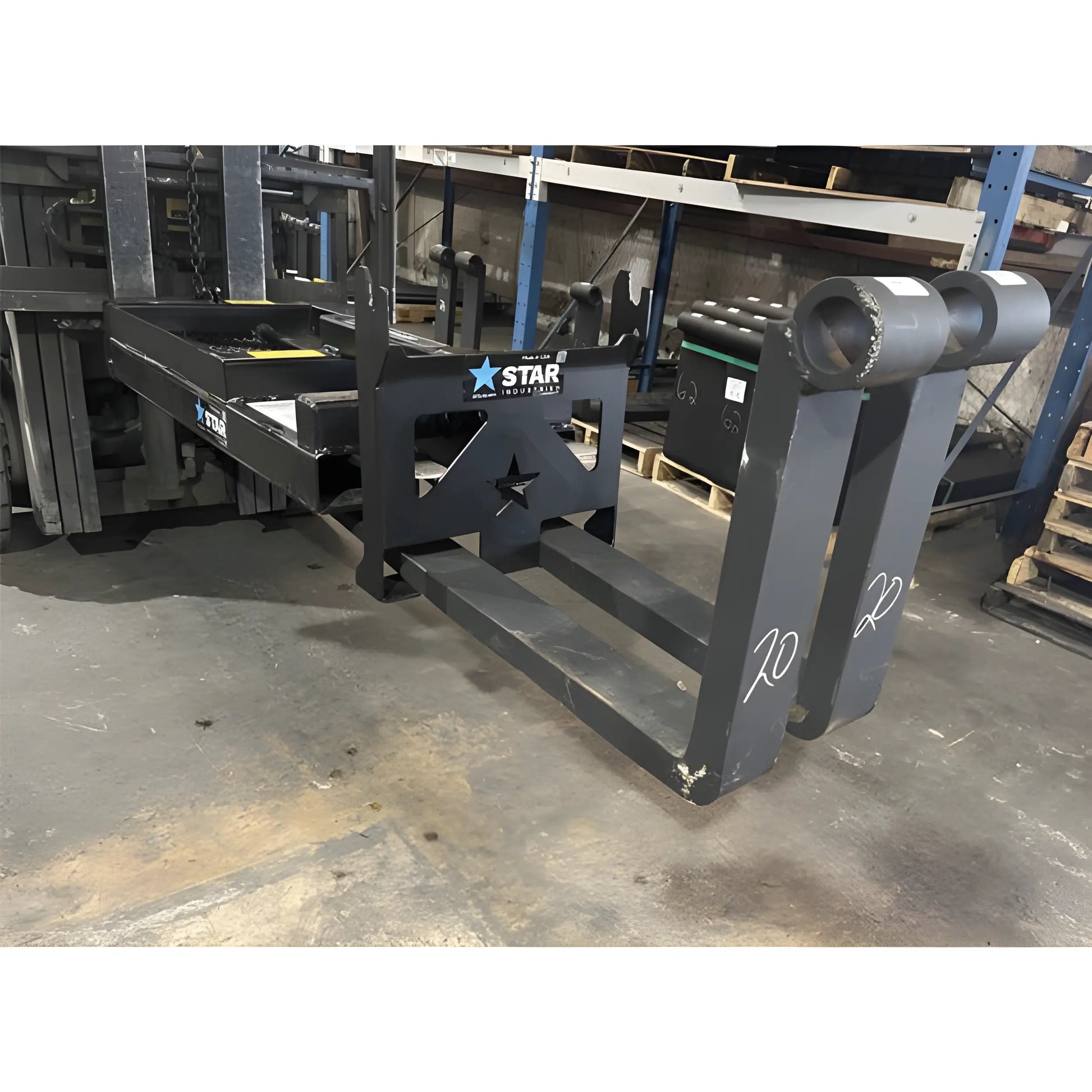 Star Industries 1390-FM heavy duty forklift attachment with reinforced steel forks in warehouse