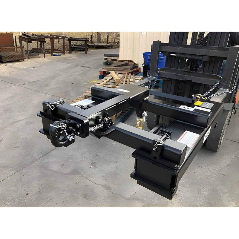 Heavy-duty forklift attachment Star Industries 1390B in black metal with securing chains on concrete floor