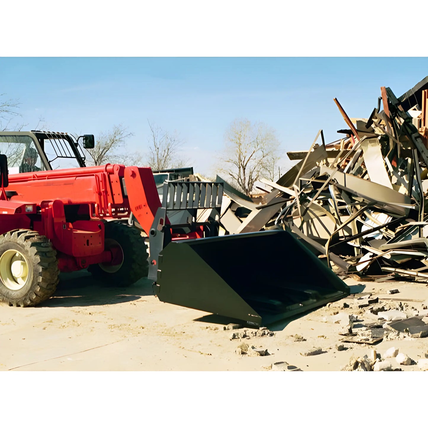 Star Industries 1408BHC red heavy-duty loader bucket attachment moving scrap metal outdoors