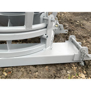 Close-up of Star Industries 1510 1510FP heavy-duty metal frame with chains on dirt ground