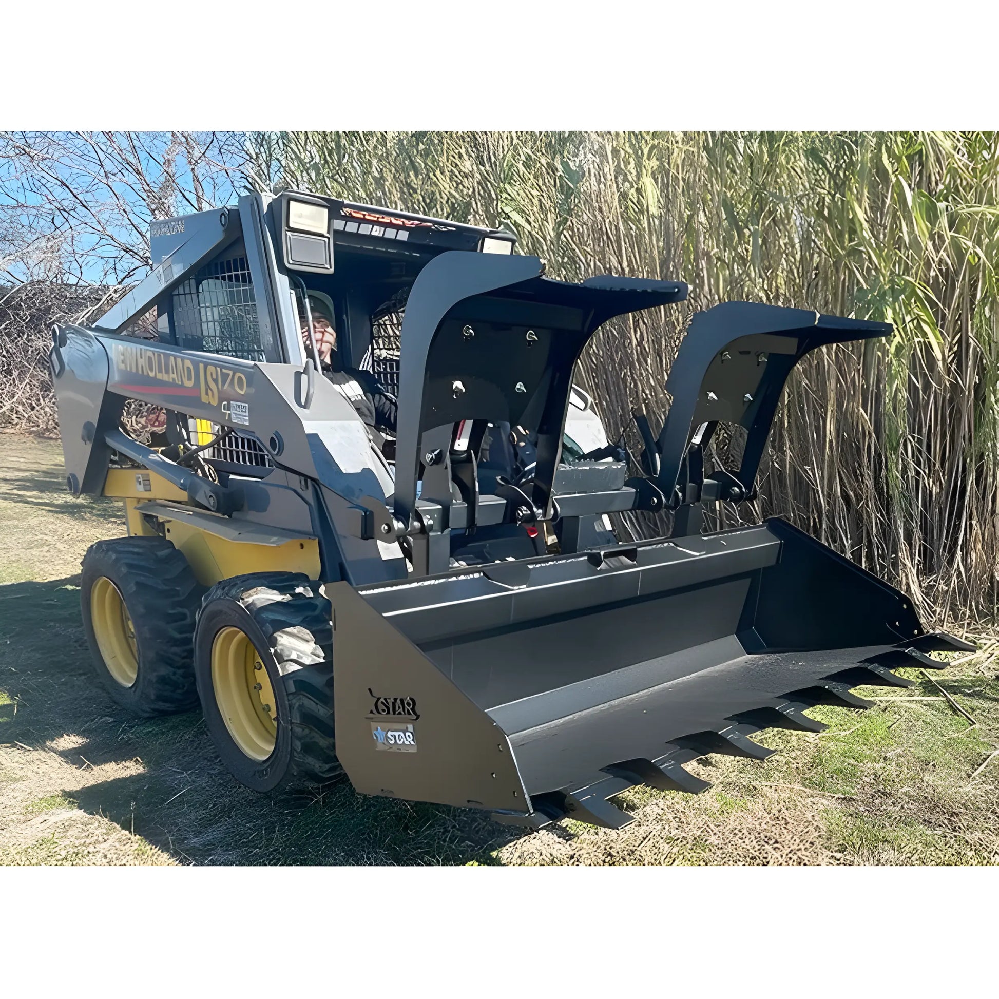 Star Industries 175-UGA skid steer grapple attachment installed on a New Holland LS170 loader outdoors