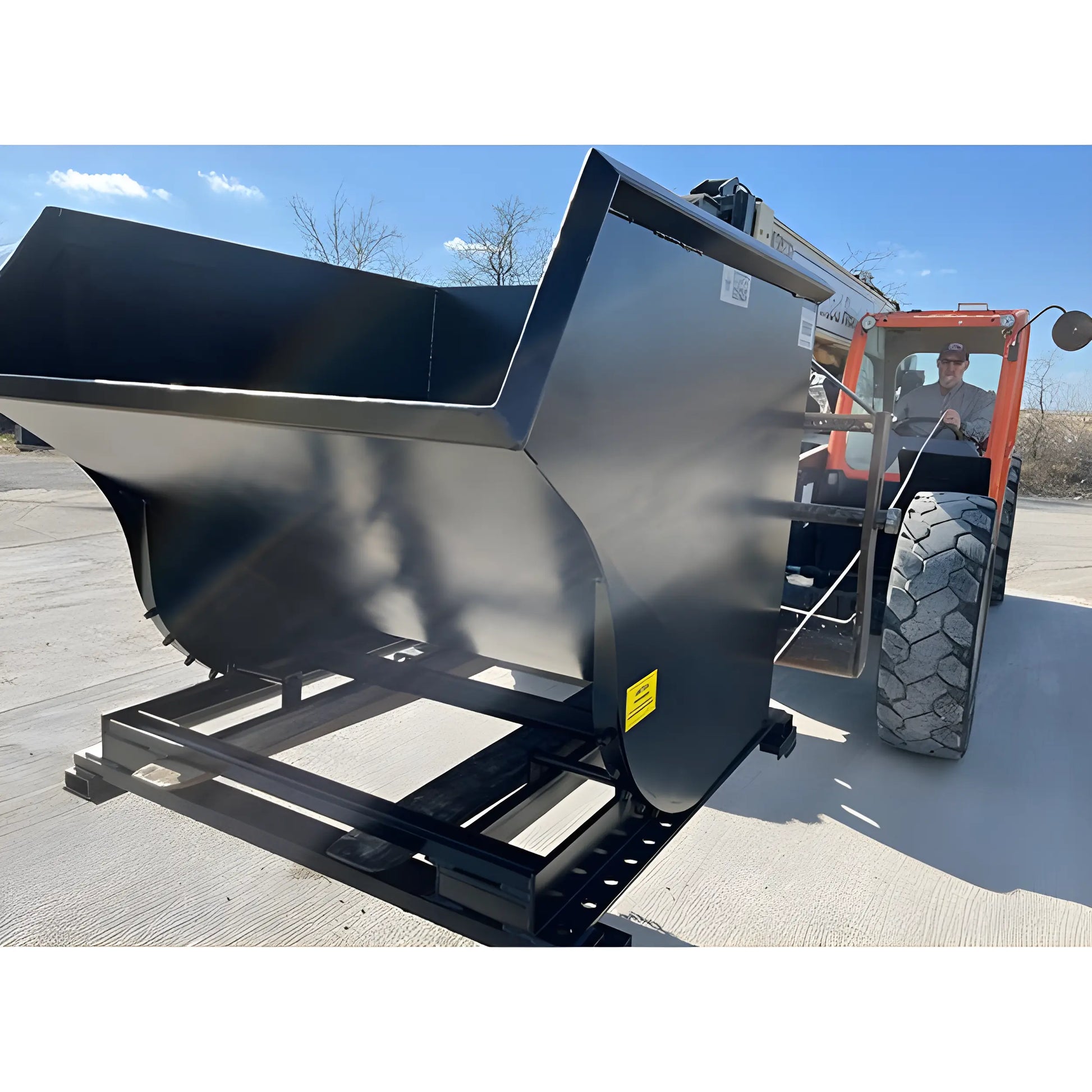 Star Industries 1810 self-dump hopper attachment on heavy machinery for material handling