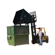 Star Industries 1825 self-dump hopper being lifted by forklift into a large green dumpster