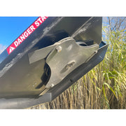 Close-up view of Star Industries 195-72 blade assembly with danger warning label in outdoor setting