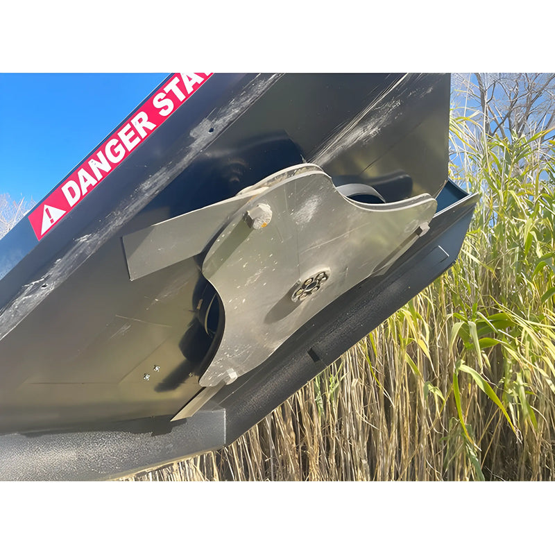 Close-up view of Star Industries 195-72 blade assembly with danger warning label in outdoor setting