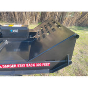 Star Industries 195-72 black metal machinery part with safety warning label on grass background