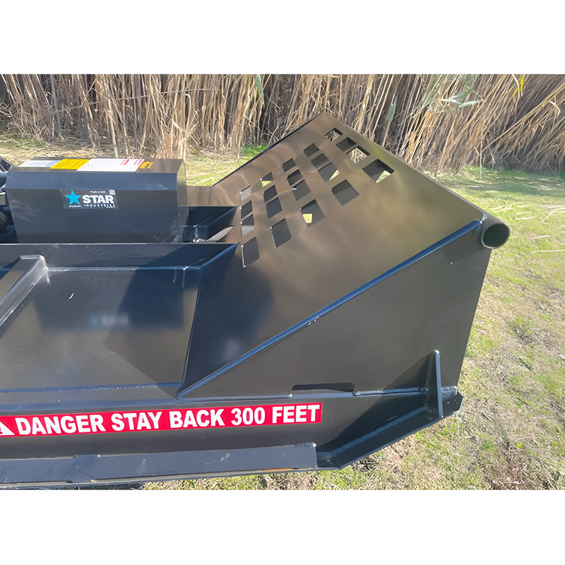 Star Industries 195-72 black metal machinery part with safety warning label on grass background