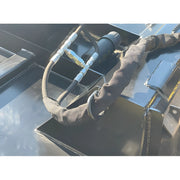 Close-up of hydraulic hoses and fittings on Star Industries 195-72 heavy equipment attachment