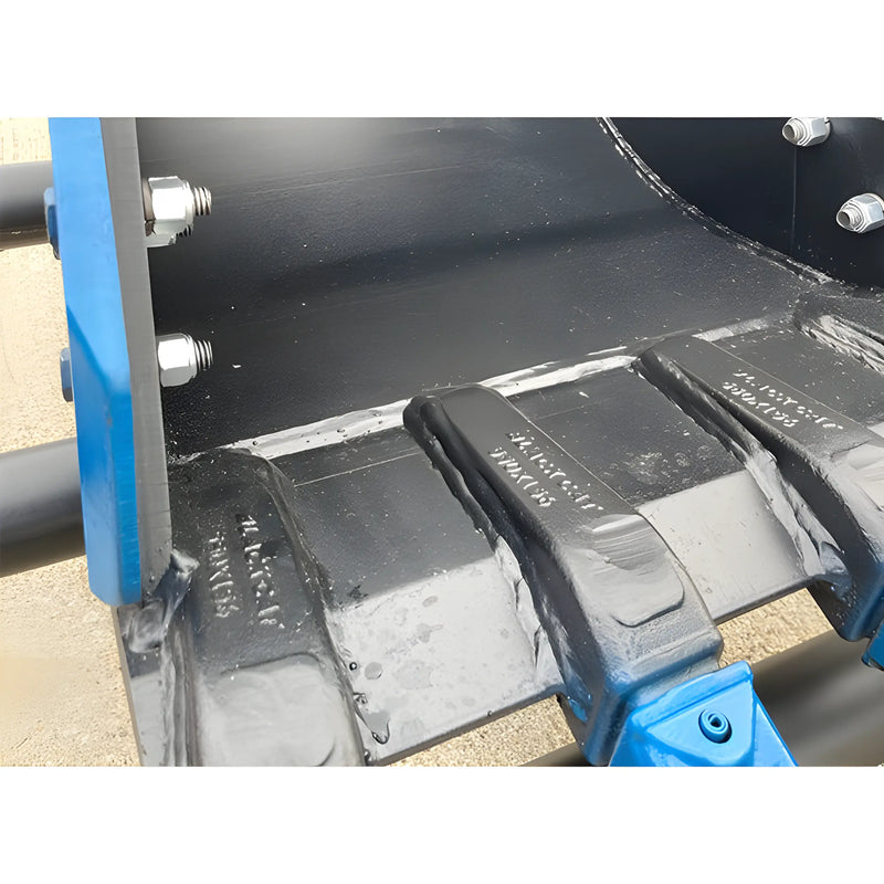 Close-up of heavy-duty black metal teeth on Star Industries 910-36 910-36T excavator bucket attachment