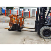 Star Industries 920 heavy-duty orange jackhammers loaded on forklift at industrial site