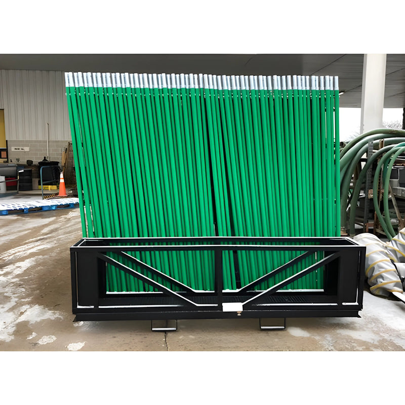 Star Industries 931 green metal fence panels stacked behind black steel frame in outdoor storage