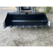 Star Industries LP22A-66 LP22A-66BOB LP22A-66T heavy-duty skid steer bucket attachment on dirt ground