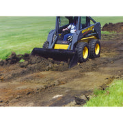 Compact skid steer loader digging soil with Star Industries LP22A-78 LP22A-78BOB LP22A-78T attachment
