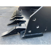 Close-up of Star Industries XD-72 heavy-duty bucket teeth attached to metal bucket edge